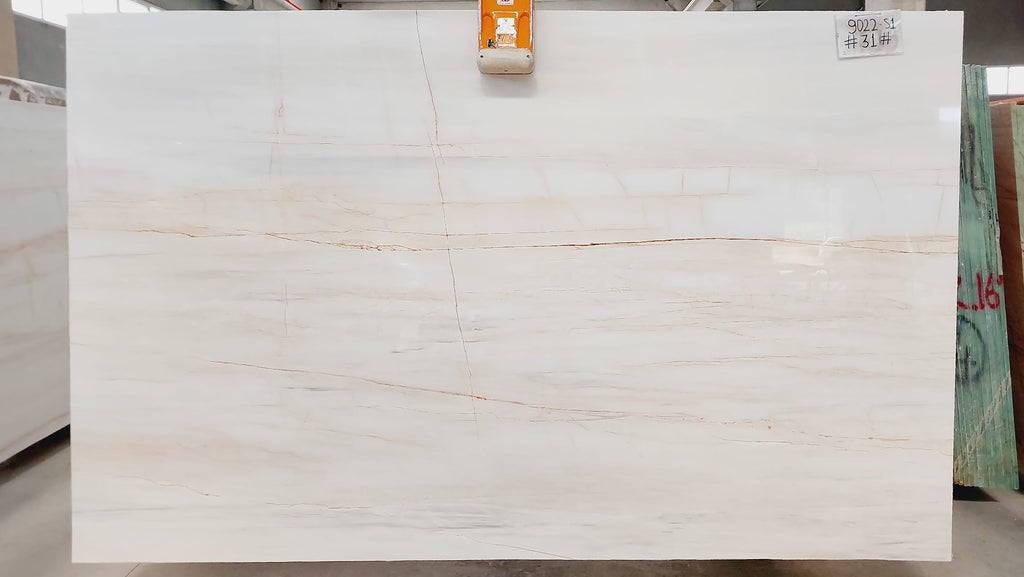White marble with warm veining slab