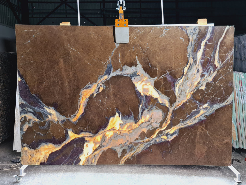 Brown and purple marble with white veining slab back lit