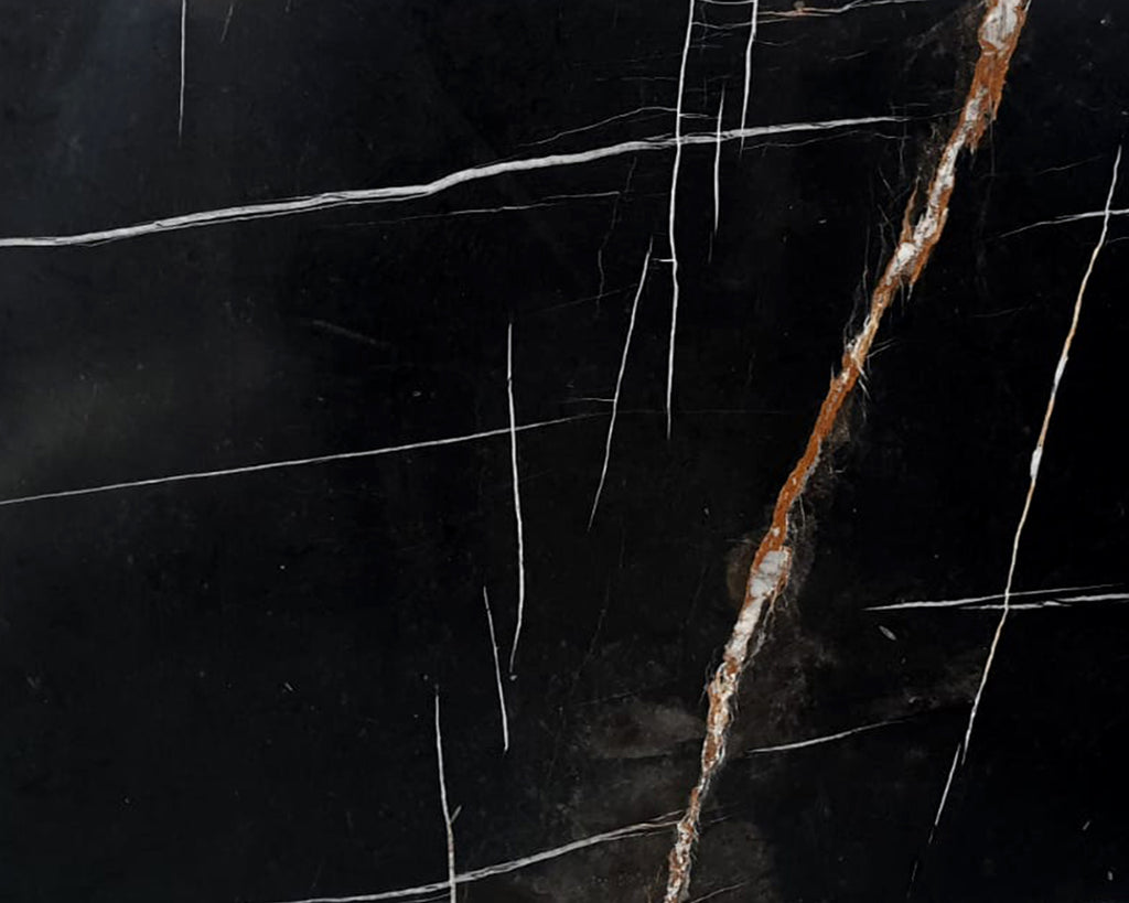 Black marble with white & gold veining