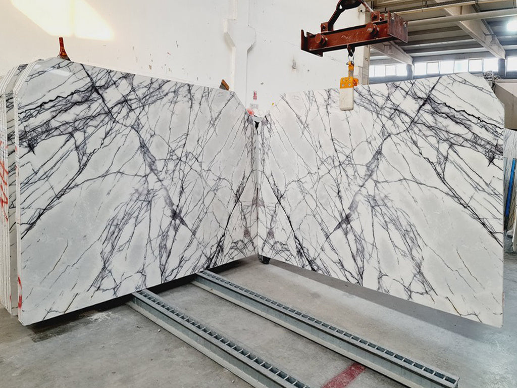 White marble with purple veining slab book matched