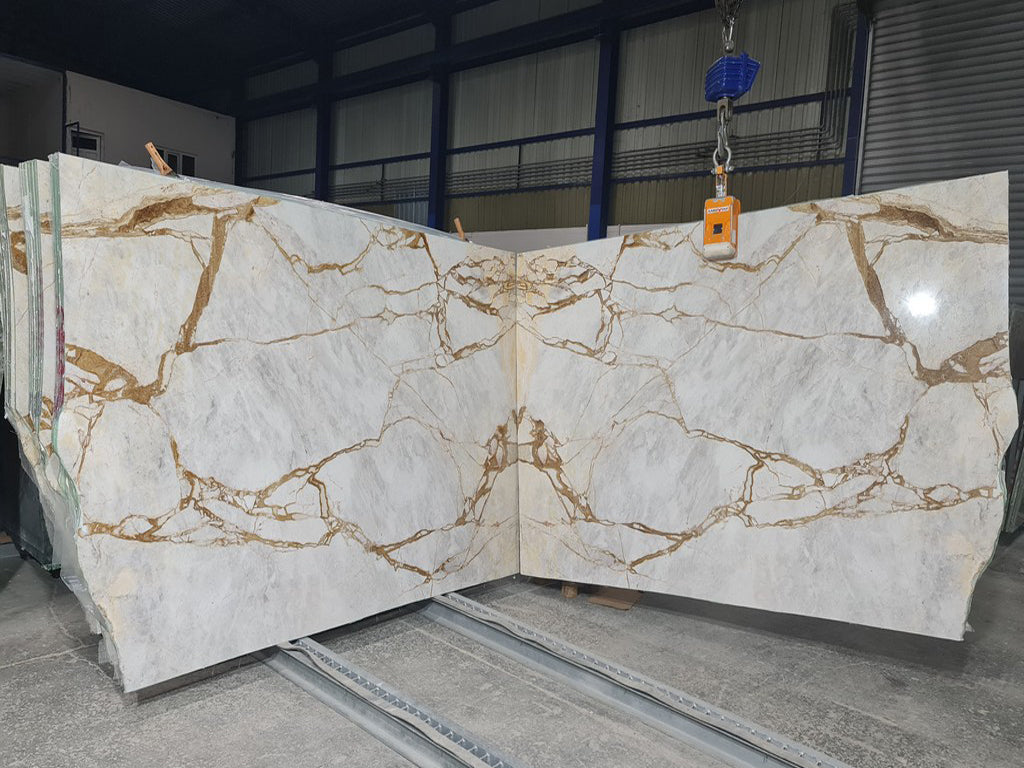 White marble with gold veining slabs book matched