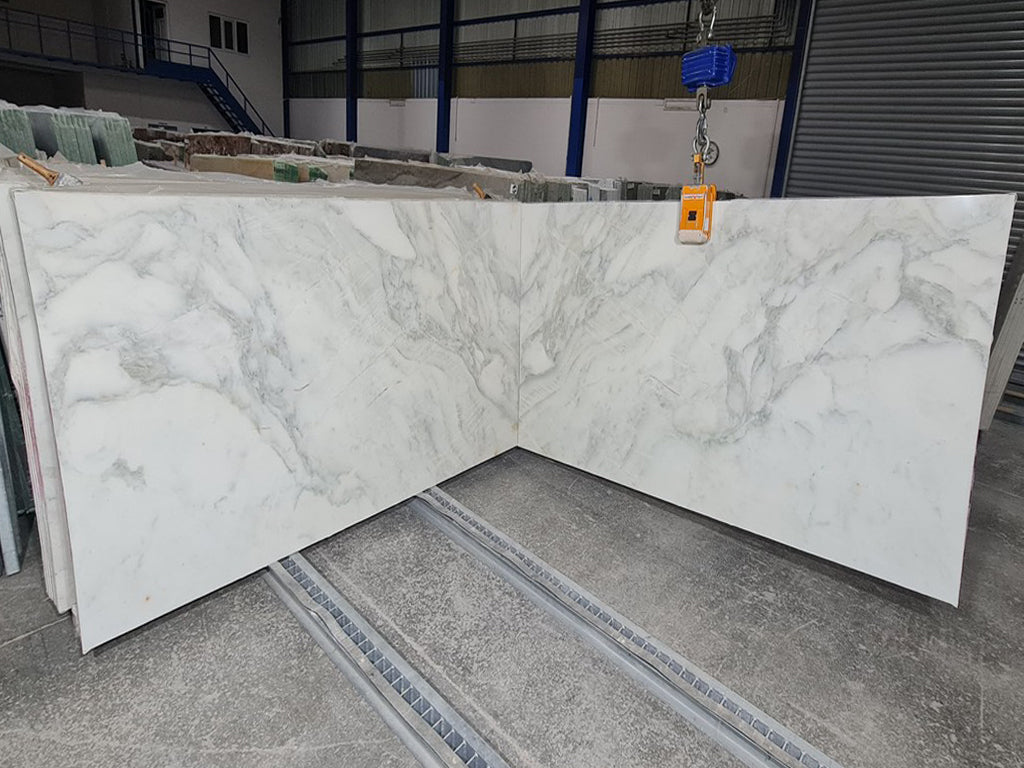White marble with green veining book matched slabs