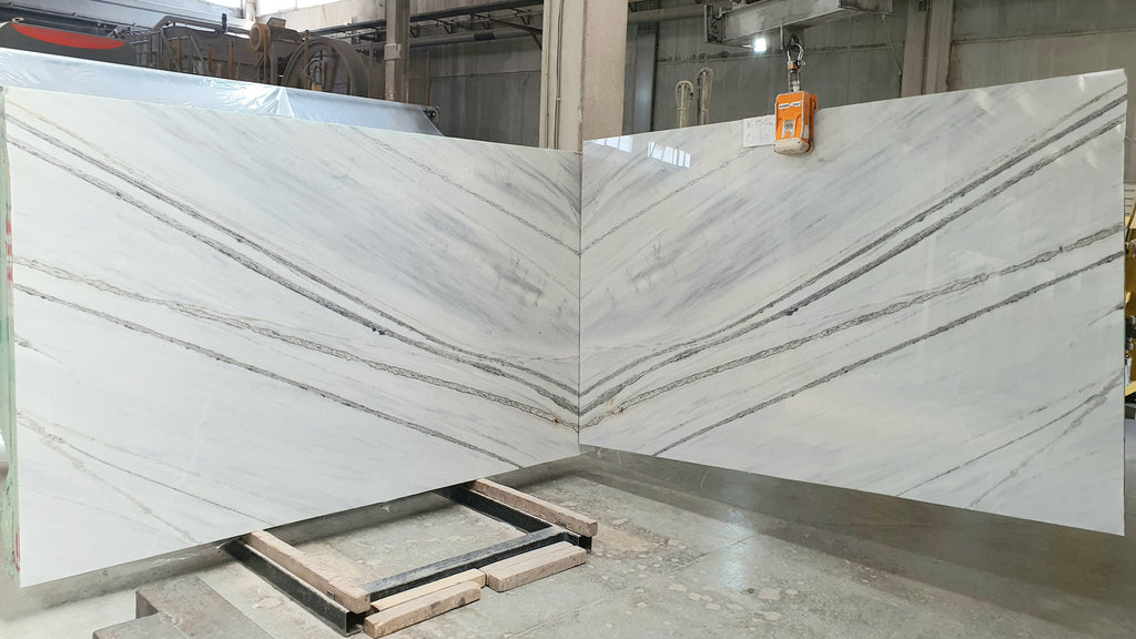 White stone with black veining slabs book matched