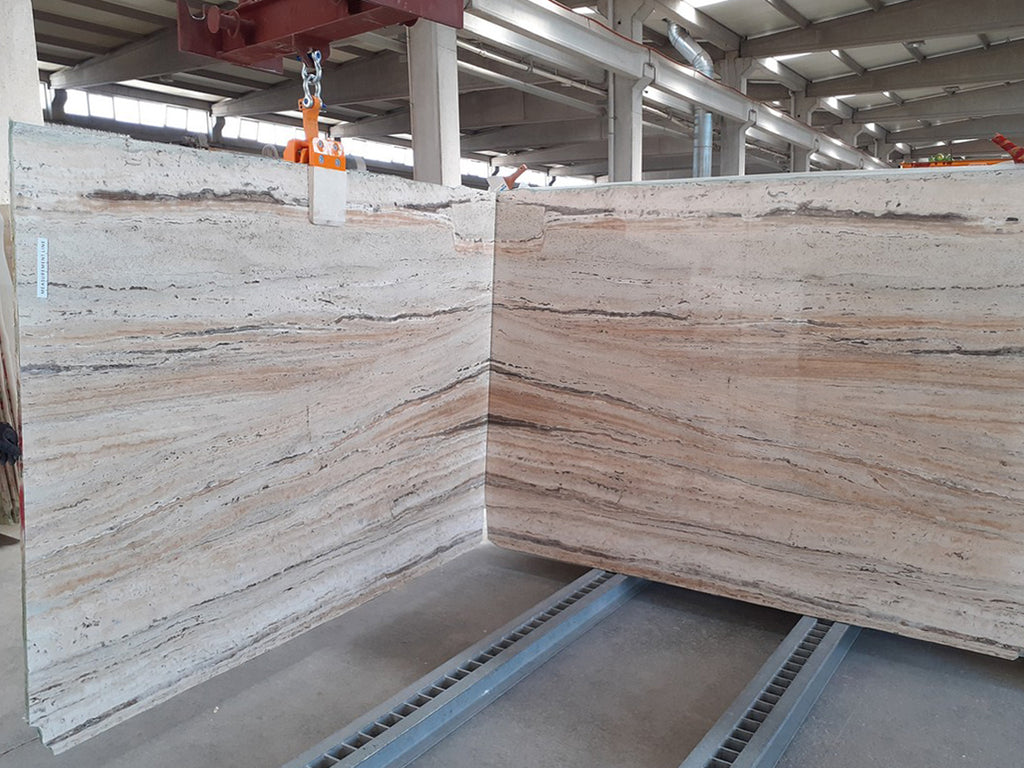 Beige travertine with warm veining slabs book matched