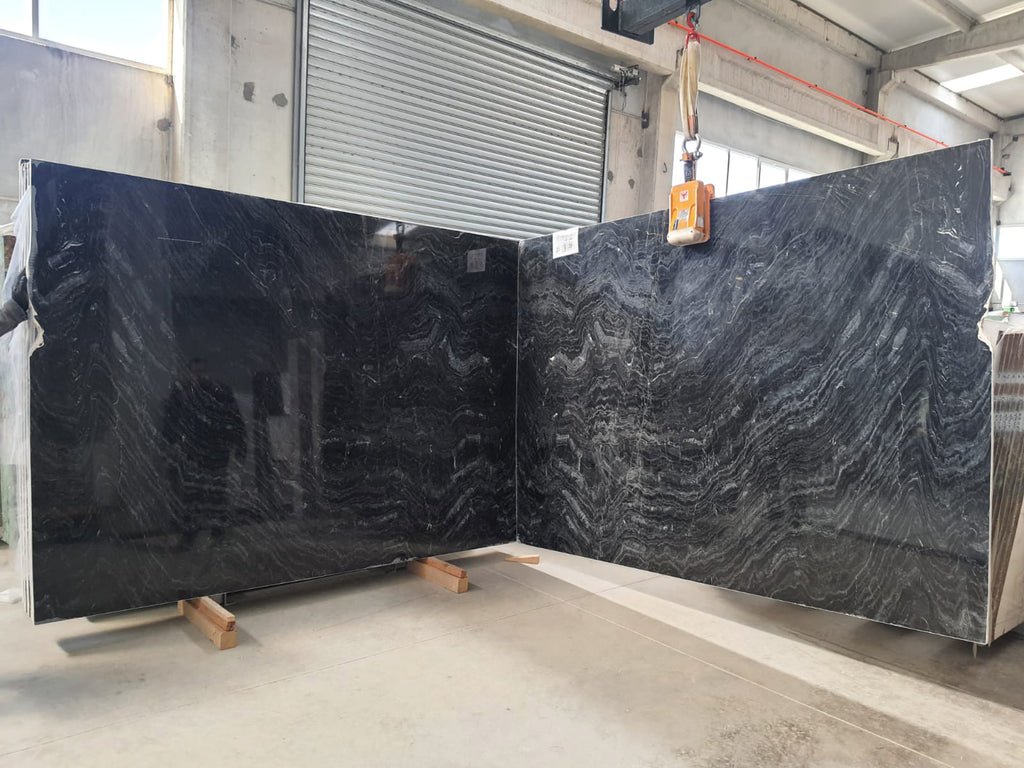 Black Stone with gray veining slabs book matching