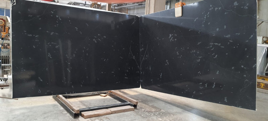 Black Marble with gray speckles book matched slabs.