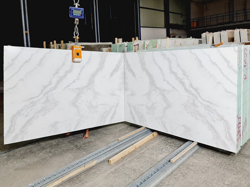 White marble with light grey veining slabs book matched