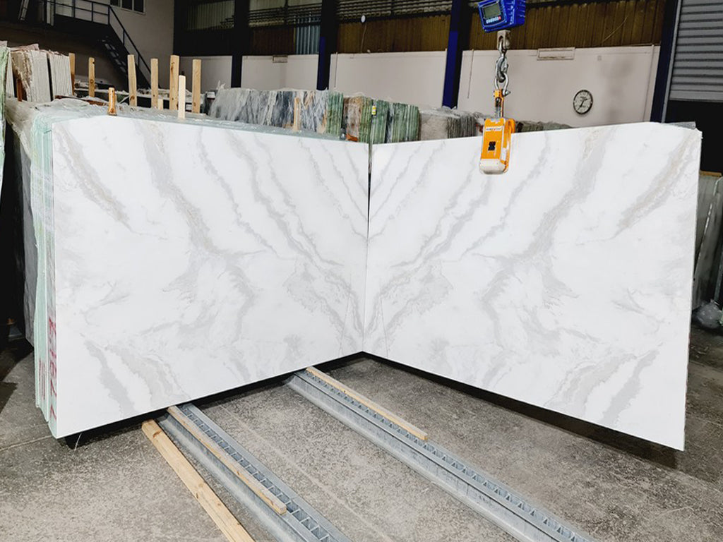 White marble with light grey veining slabs book matched