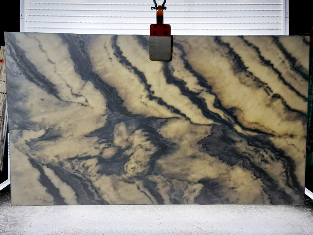 White marble with light grey veining slab backlit