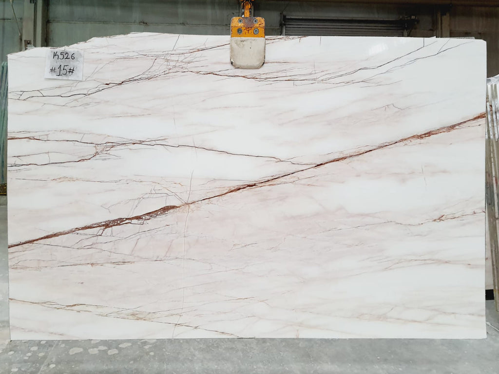 White marble with red veining slab