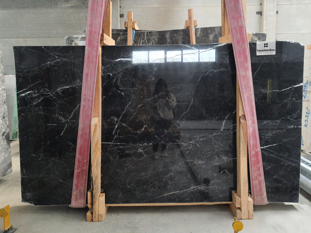 Dark marble with white veining slab.
