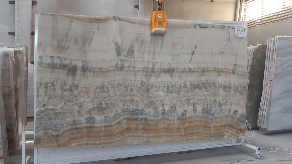 Beige Onyx with orange and blue veining slab