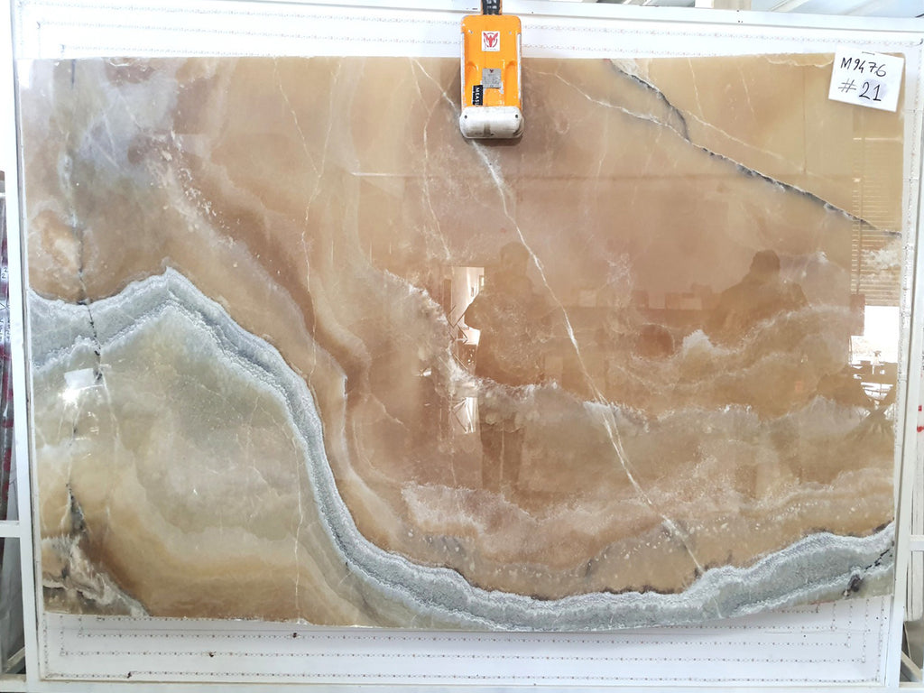Beige Onyx with gray veining slab back lit