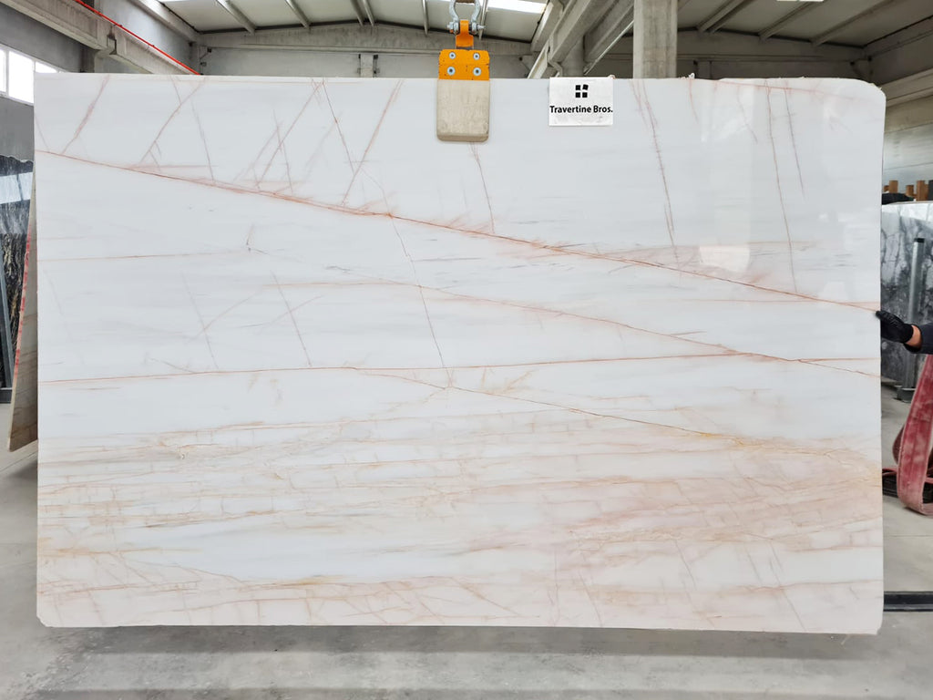 White marble with blush veining slab