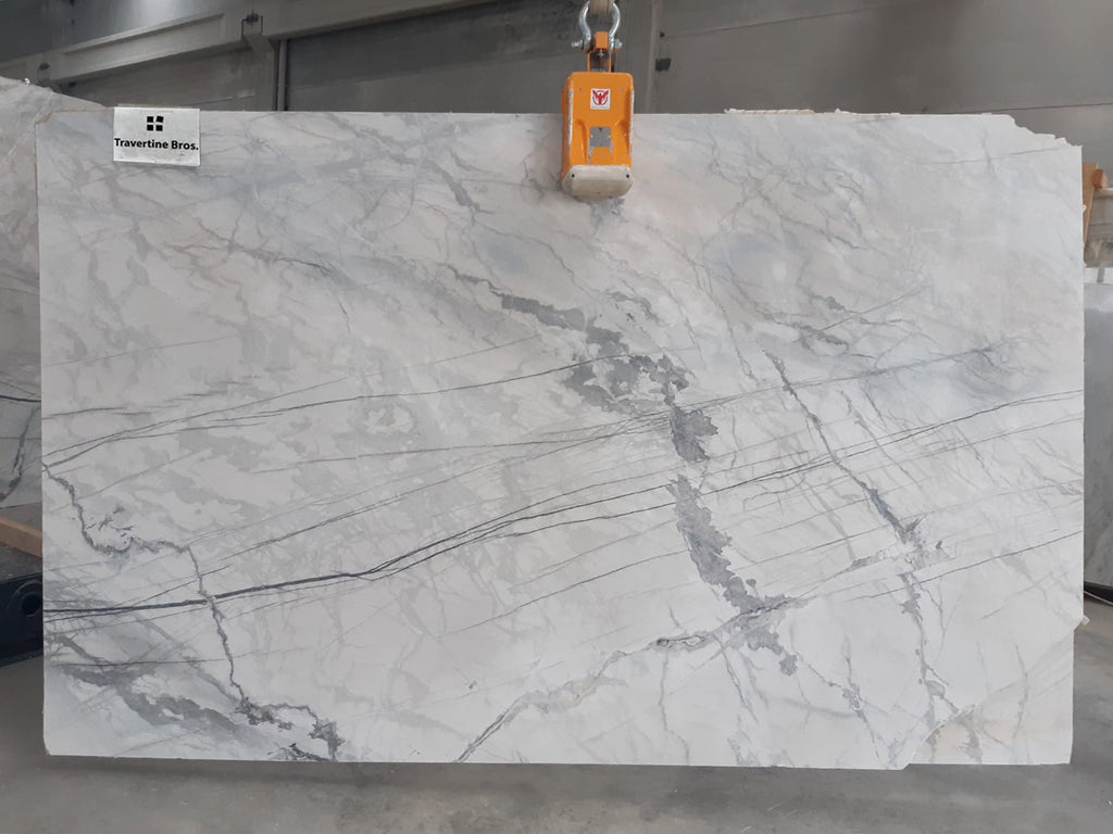 Gray marble with dark gray and black lines.