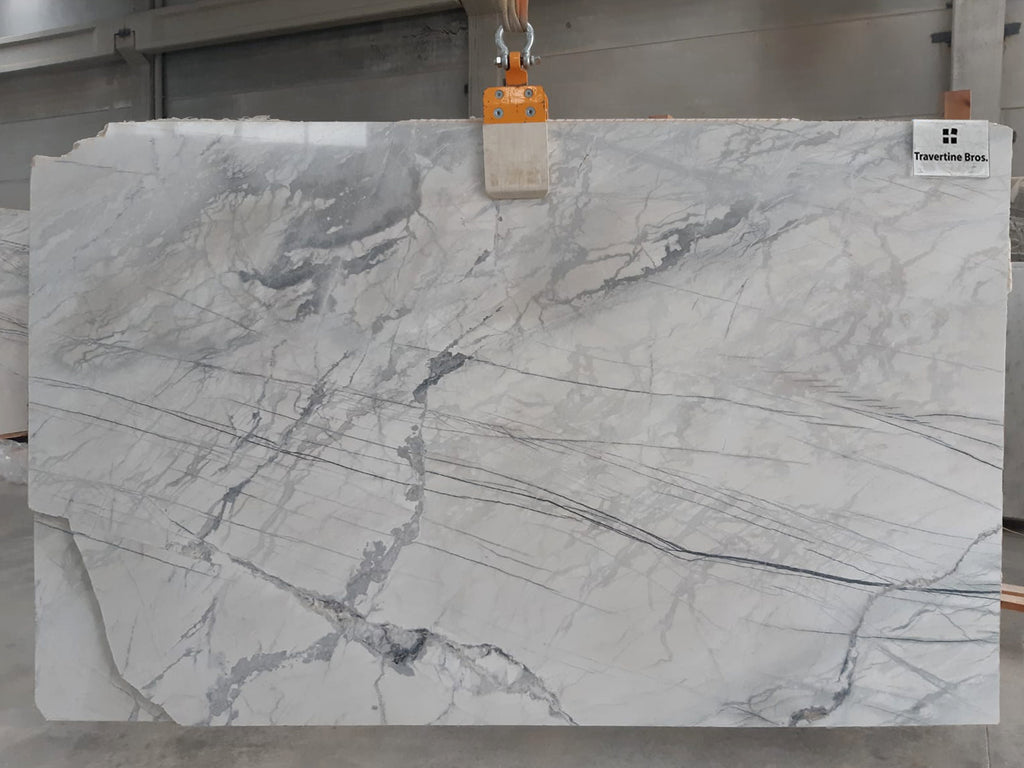 Gray marble with dark gray and black lines.