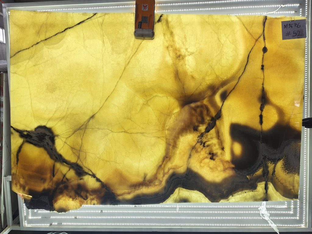 Beige Onyx with gray veining slab back lit