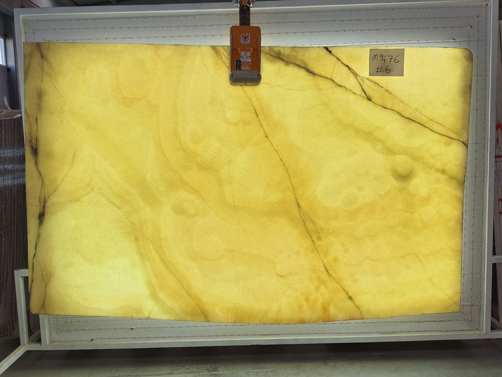 Beige Onyx with gray veining slab back lit