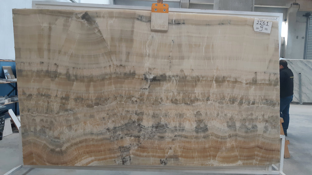 Beige Onyx with orange and blue veining slab