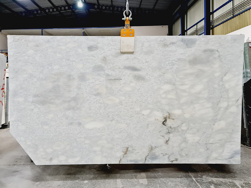 White Marble with Pebble Look Slab
