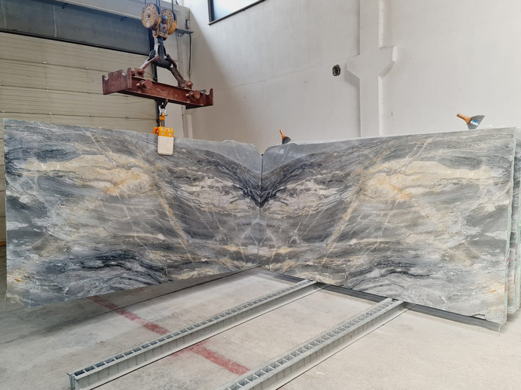 Gray/Blue stone with gold veining Book matched slab