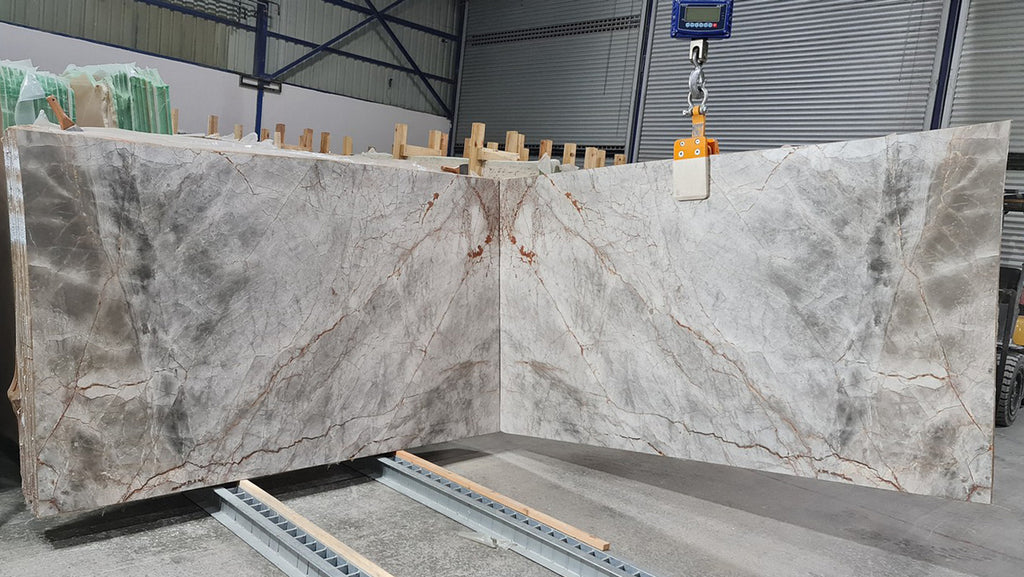 Gray marble with veining slabs book matched