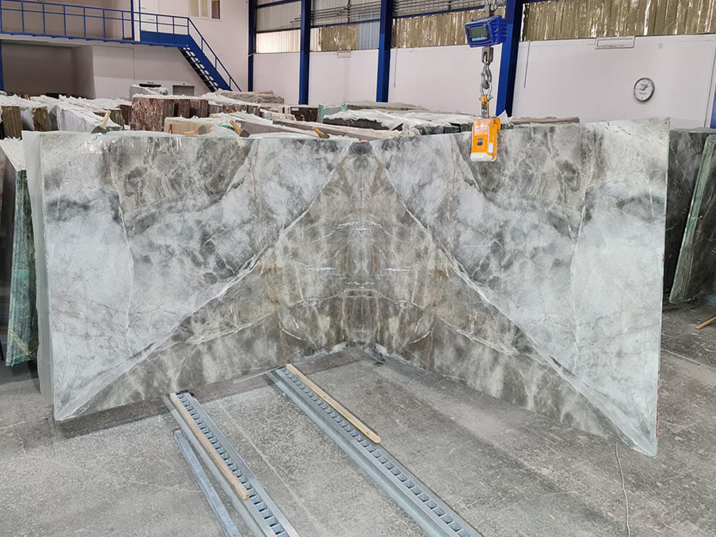 Gray marble with veining slabs book matched