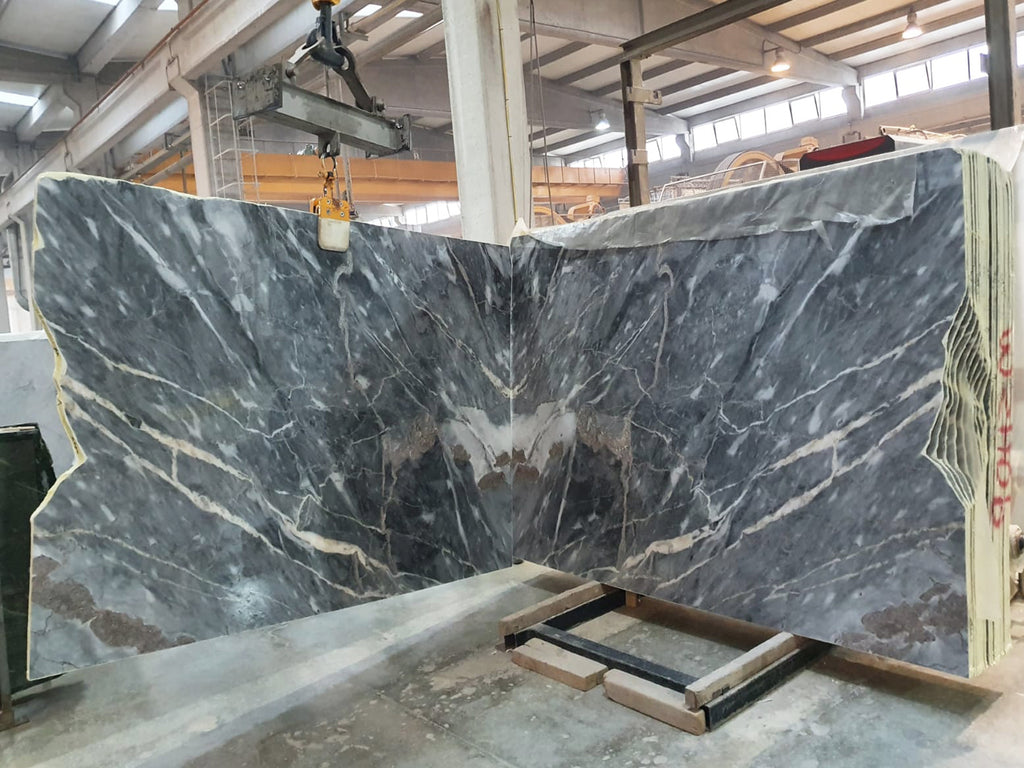 Gray marble with white & gold veining slabs book matched