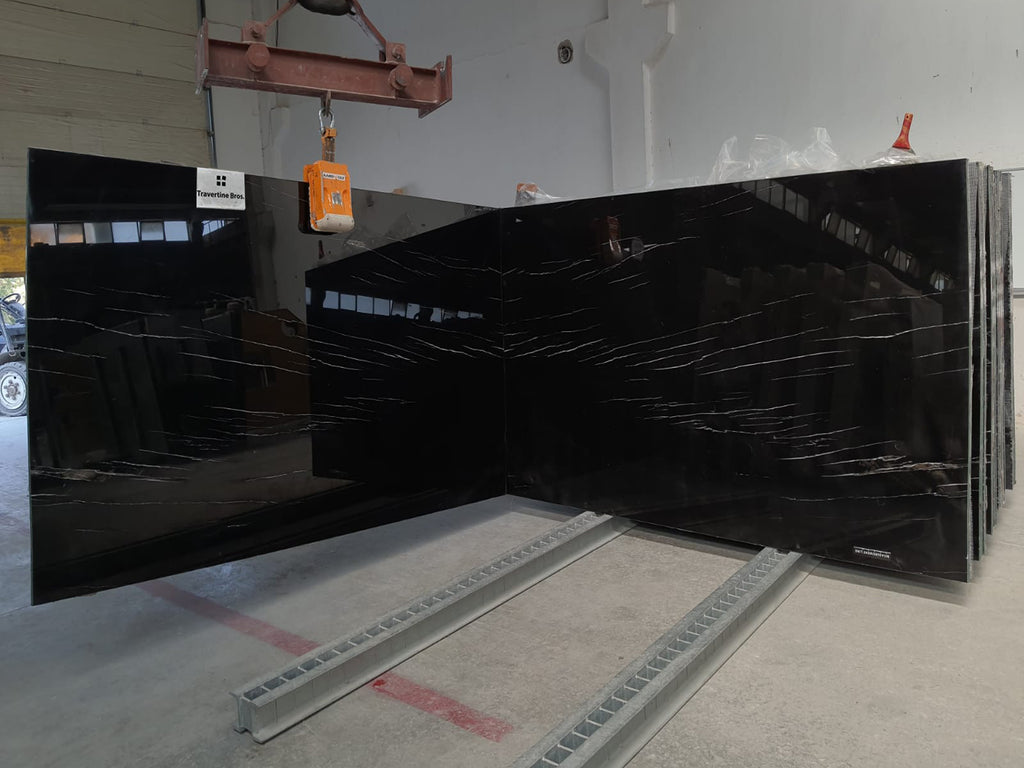 Black Marble with white veining slabs bookmatched.