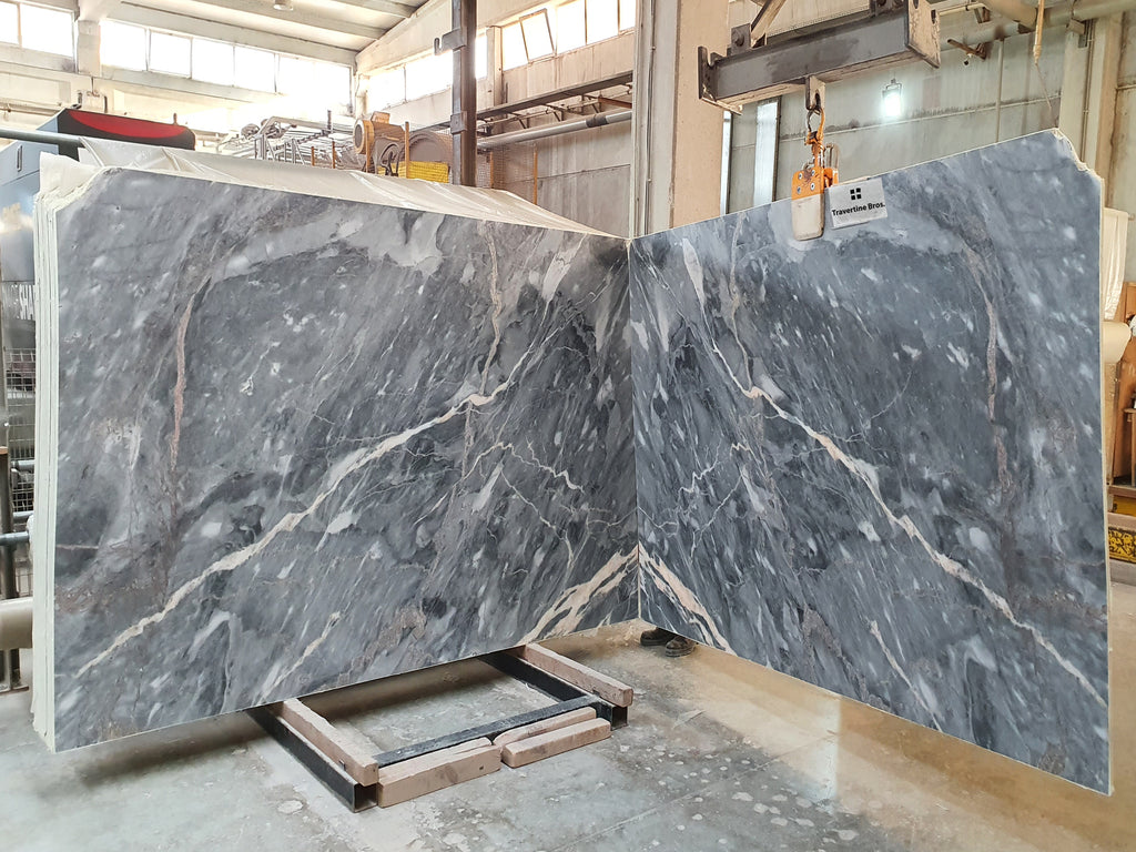 Gray marble with white & gold veining slabs book matched