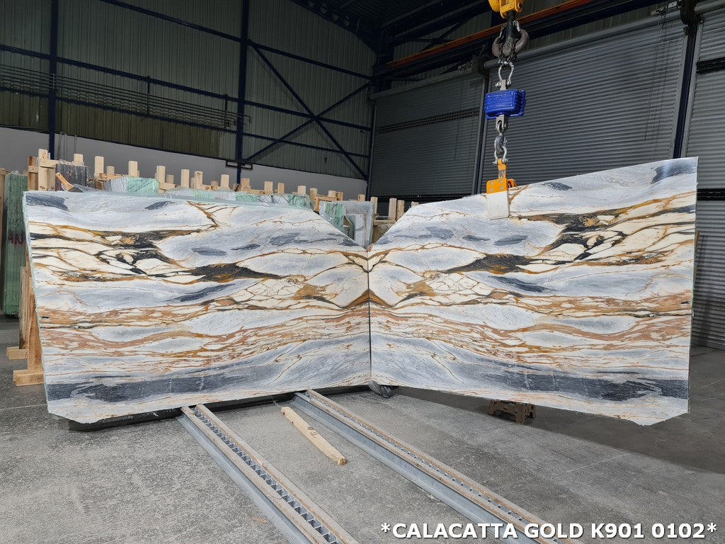 Marble with blue & gold veining book matched slabs
