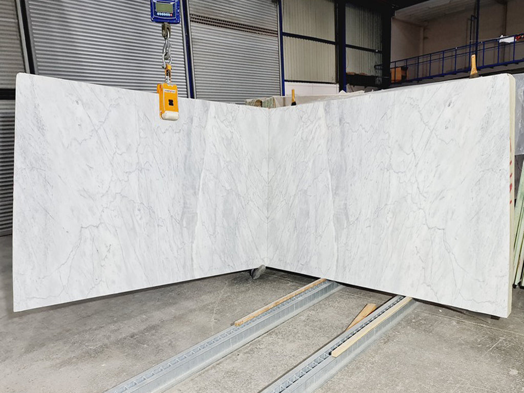White marble with gray veining slabs book matched