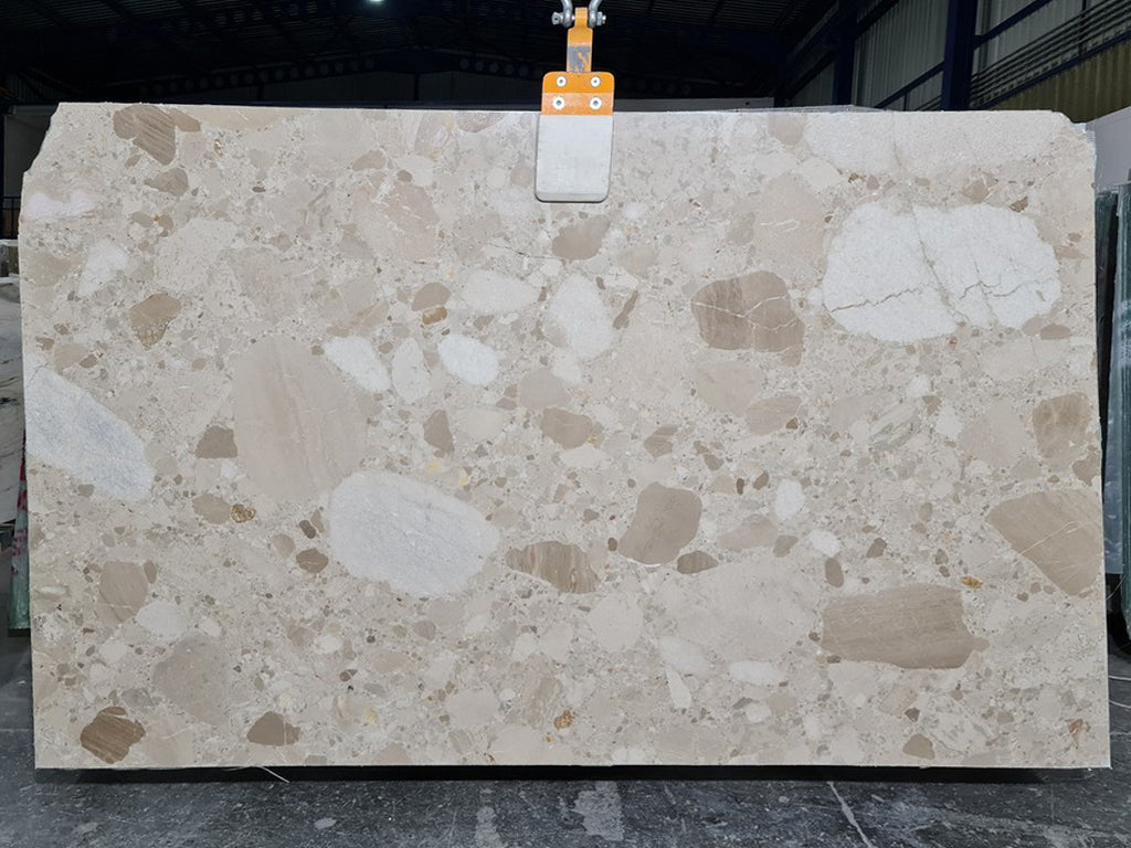 Beige marble with tonal pebble pattern slab