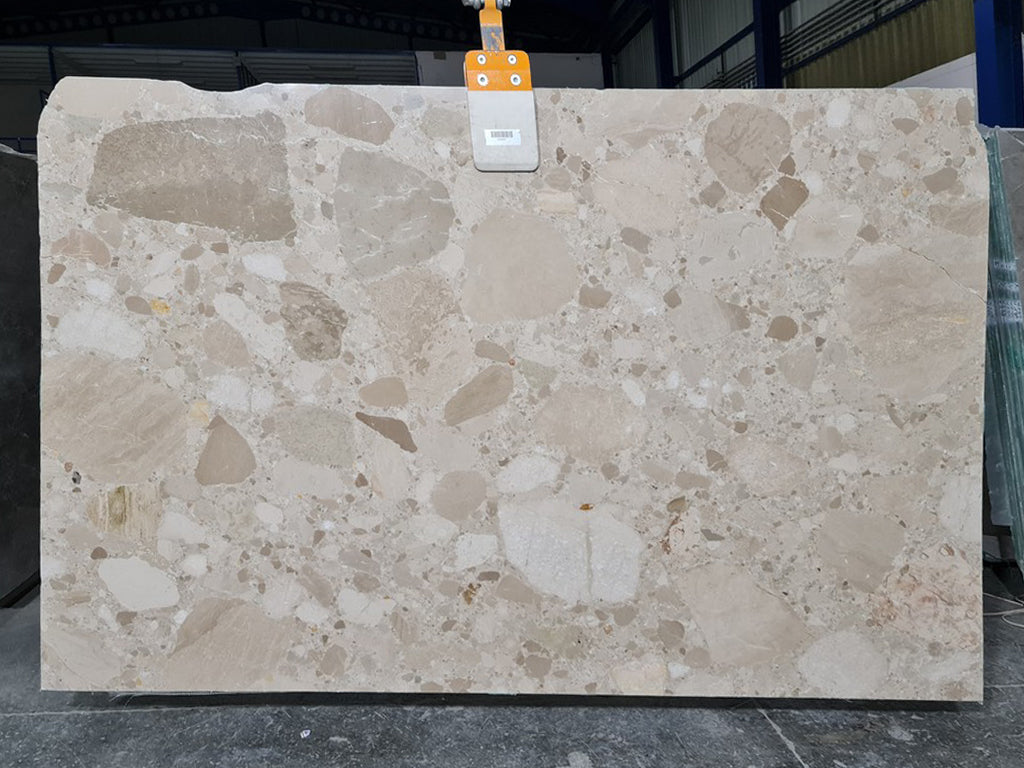 Beige marble with tonal pebble pattern slab