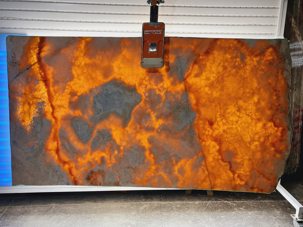 Coca cola textured onyx slab back lit