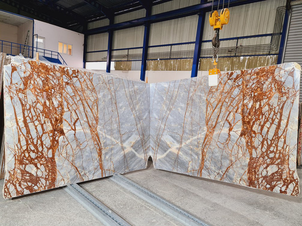Blue Gray stone with red/orange veining slabs book matched