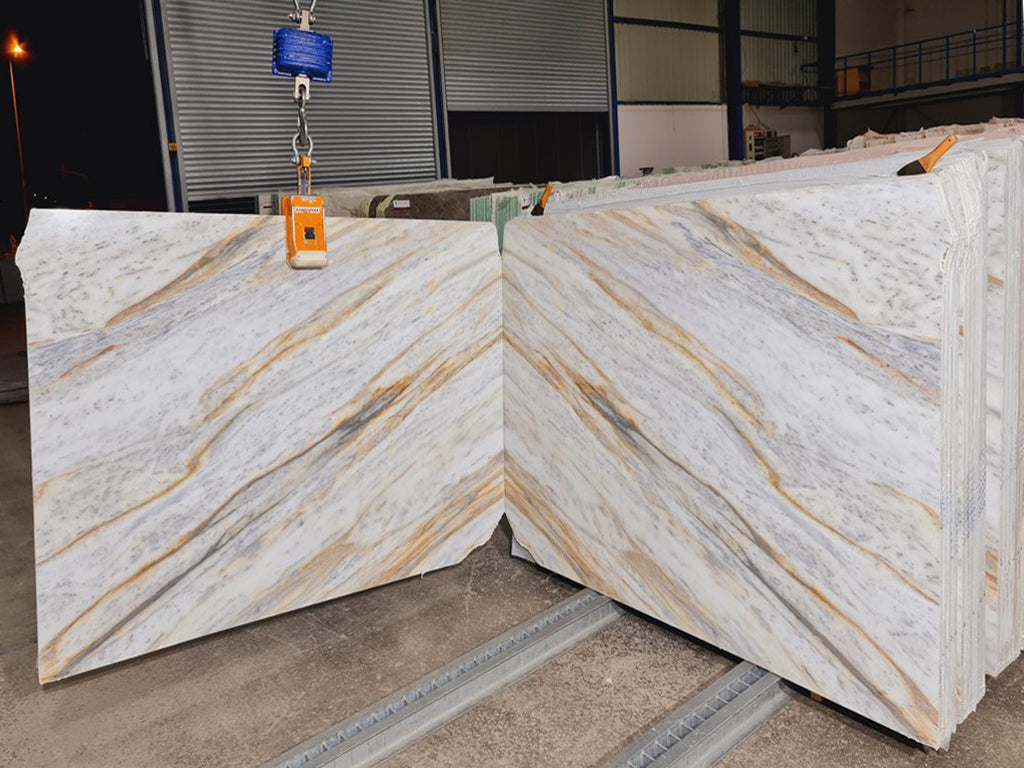 White/Gray stone with orange veining slabs book matched