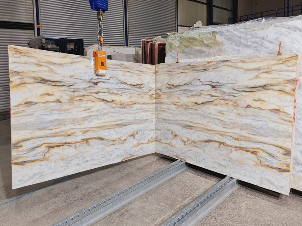 White/Gray stone with orange veining slabs book matched