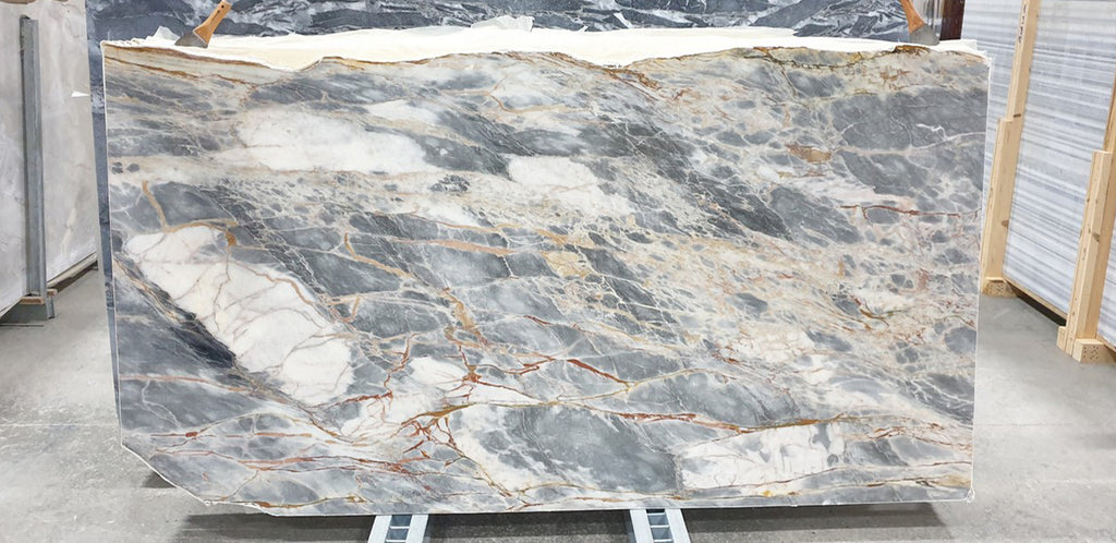 Blue marble slab with white and red features