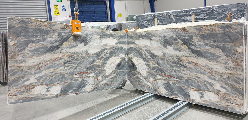 Blue marble slabs with white and red features