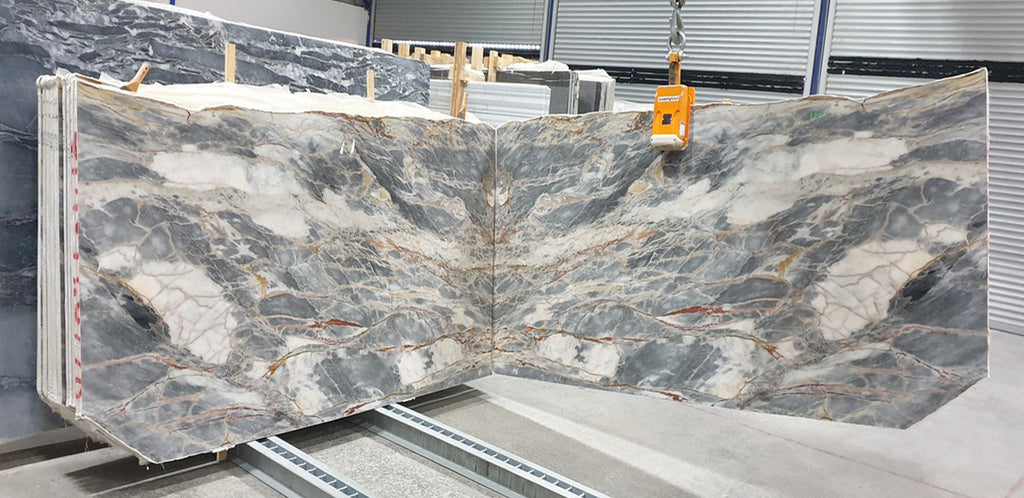 Blue marble slabs with white and red features