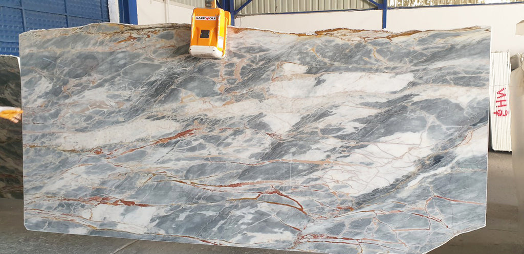 Blue marble slab with white and red features