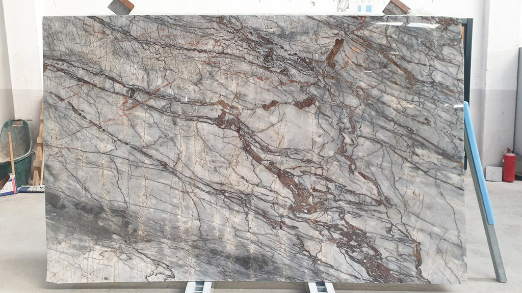 Gray stone slab with red & dark gray veining