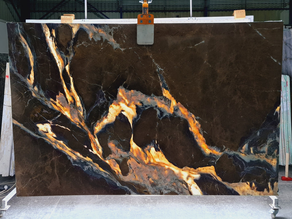 Brown and purple marble with white veining slab back lit
