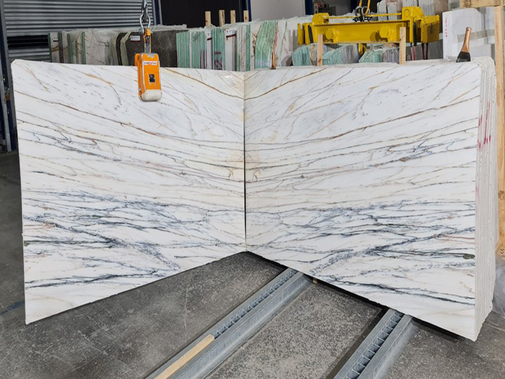 White Marble with gold & green veining book matched