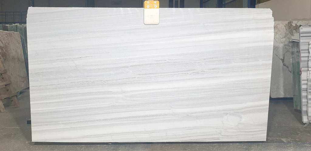 White marble with linear veining slab