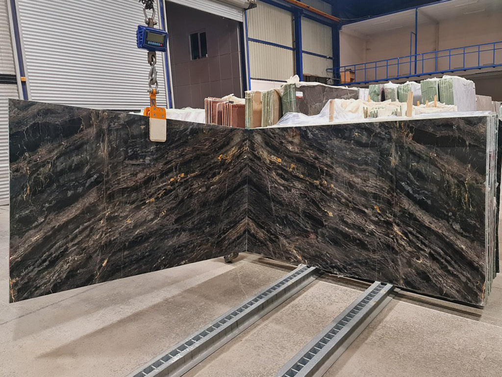 Black Marble with gold veining slabs book matched