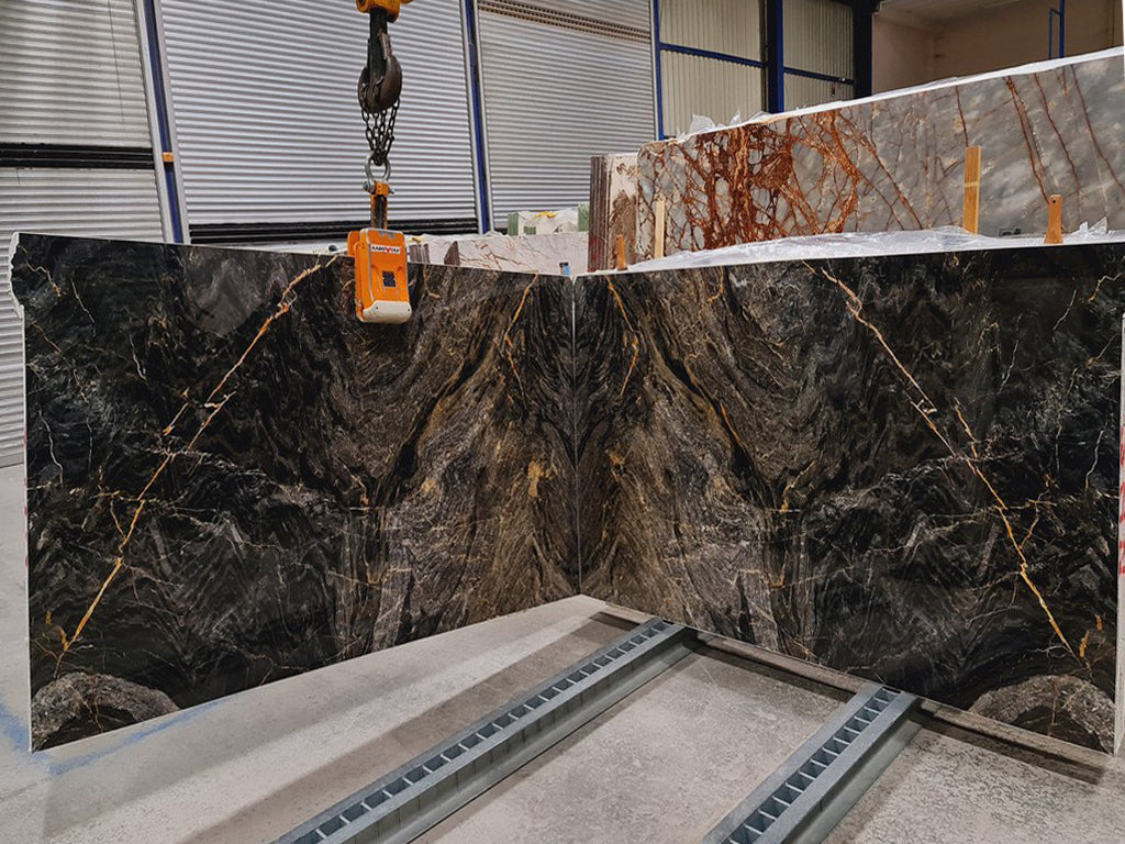 Black Marble with gold veining slabs book matched