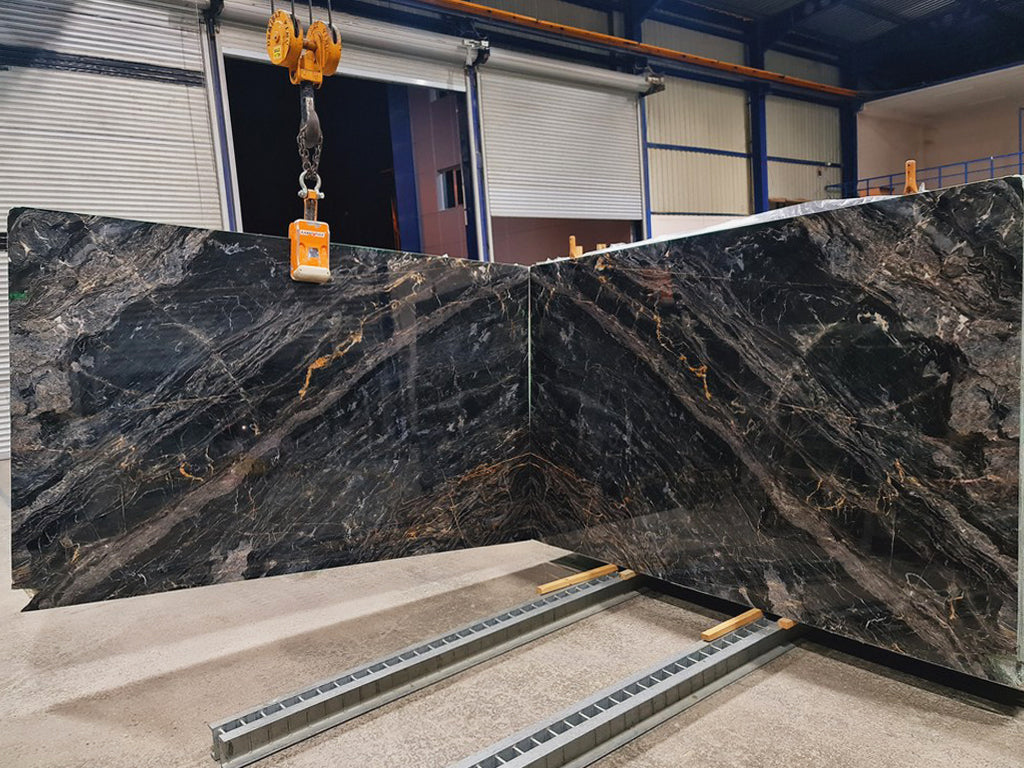 Black Marble with gold veining slabs book matched