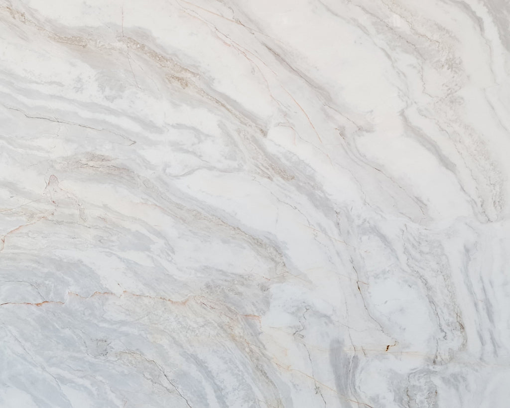 White marble with gray cloudy veining. 
